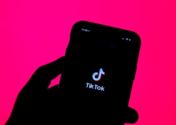 TikTok logo on phone with Oracle and ByteDance